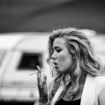 Traveller girl smokes a cigarette