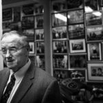 Thomas-Reid-one-of-the-founders-of-Donore-Boxing-Club stands with wall of fame pictures behind him