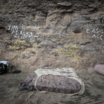 Rocky Place of fasting and prayer with seats and graffiti on the rock