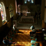 Sisters inside the church, view from the choir loft