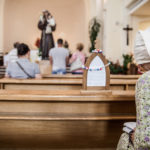 A woman prays at the church in Medjugorje