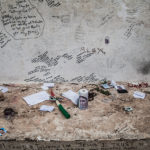 Texts and various objects left on the wall by the pilgrims at Medjugorje pilgrimage site