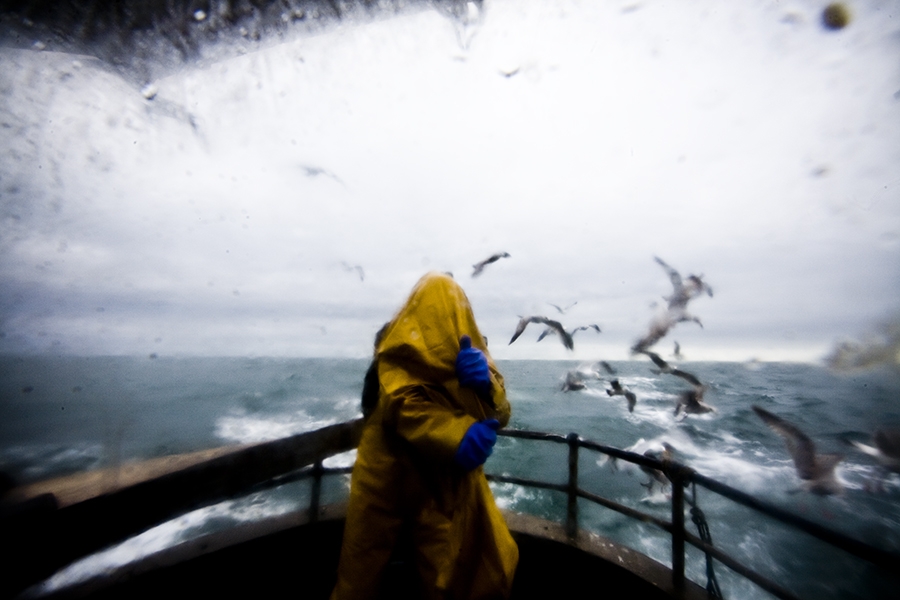 Irish Sea, a fisherman in yellow jacket on the boat