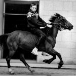 Teenage bareback rider on the street of Dublin